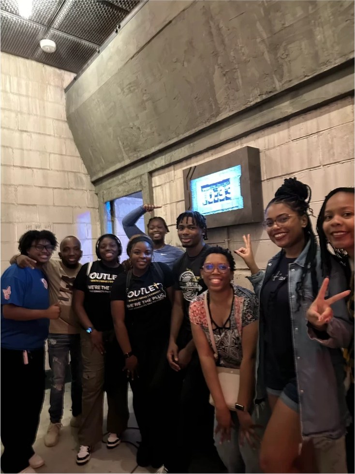Outlet members hanging out at a group event